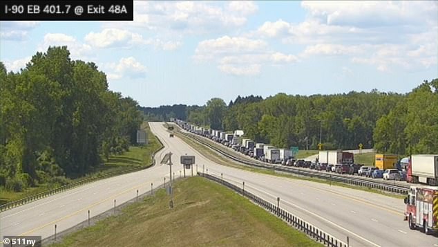 Traffic was at a standstill on I-90 this afternoon after a tour bus traveling eastbound lost control, went over the median and overturned in a ditch