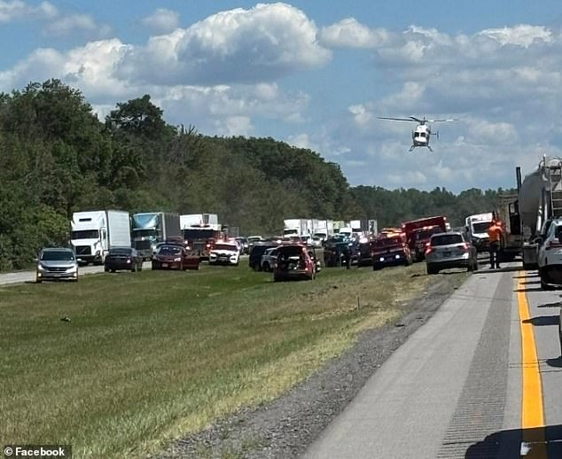 Multiple Mercy Flight helicopters have responded to the scene as rescuers try to help passengers who remain trapped and injured