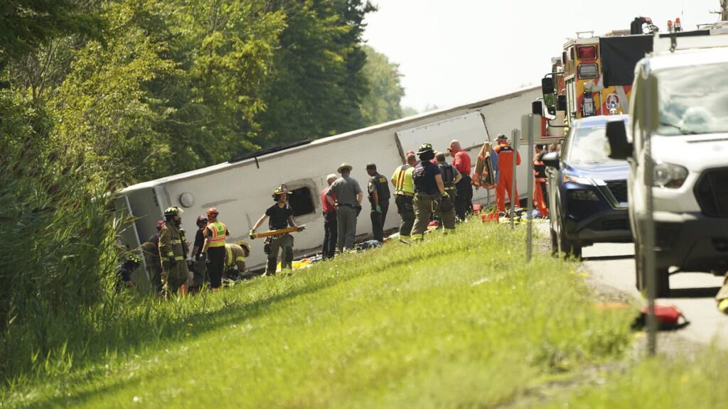 Five killed in horror bus crash after vehicle carrying 52 passengers flipped on busy highway in Upstate New York