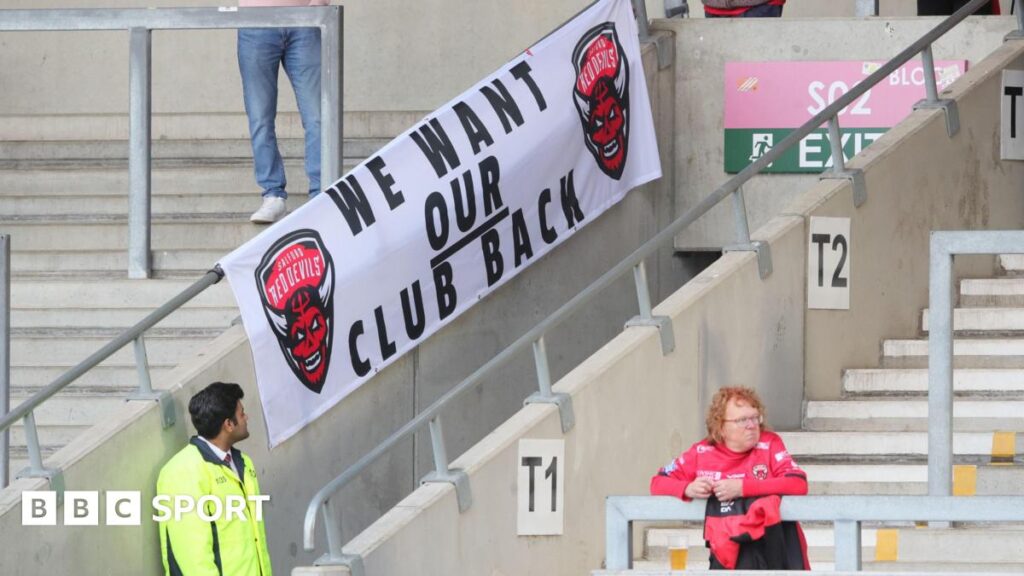 A Salford Red Devils banner displaying the message