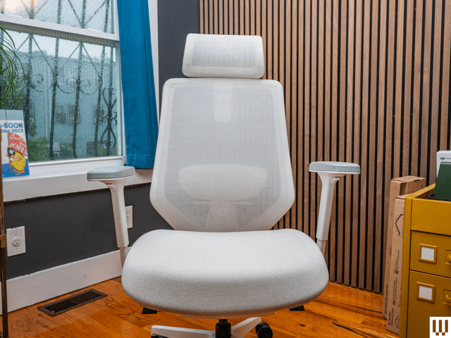 Image may contain: Indoors, Interior Design, Wood, Furniture, Chair, Plywood, Hardwood, and Wood Panels