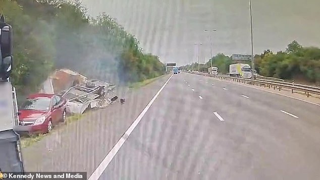 As the car manages to come to a stop the caravan is tipped on its side leaving the holiday home in a crumpled mess on the side of the motorway