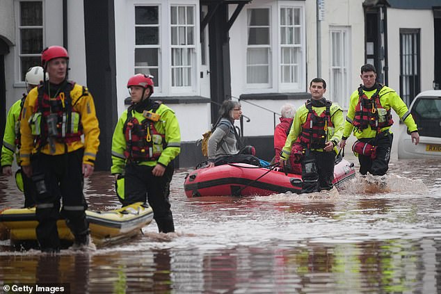 MONMOUTH: Locals being helped by the rescue teams during the floods
