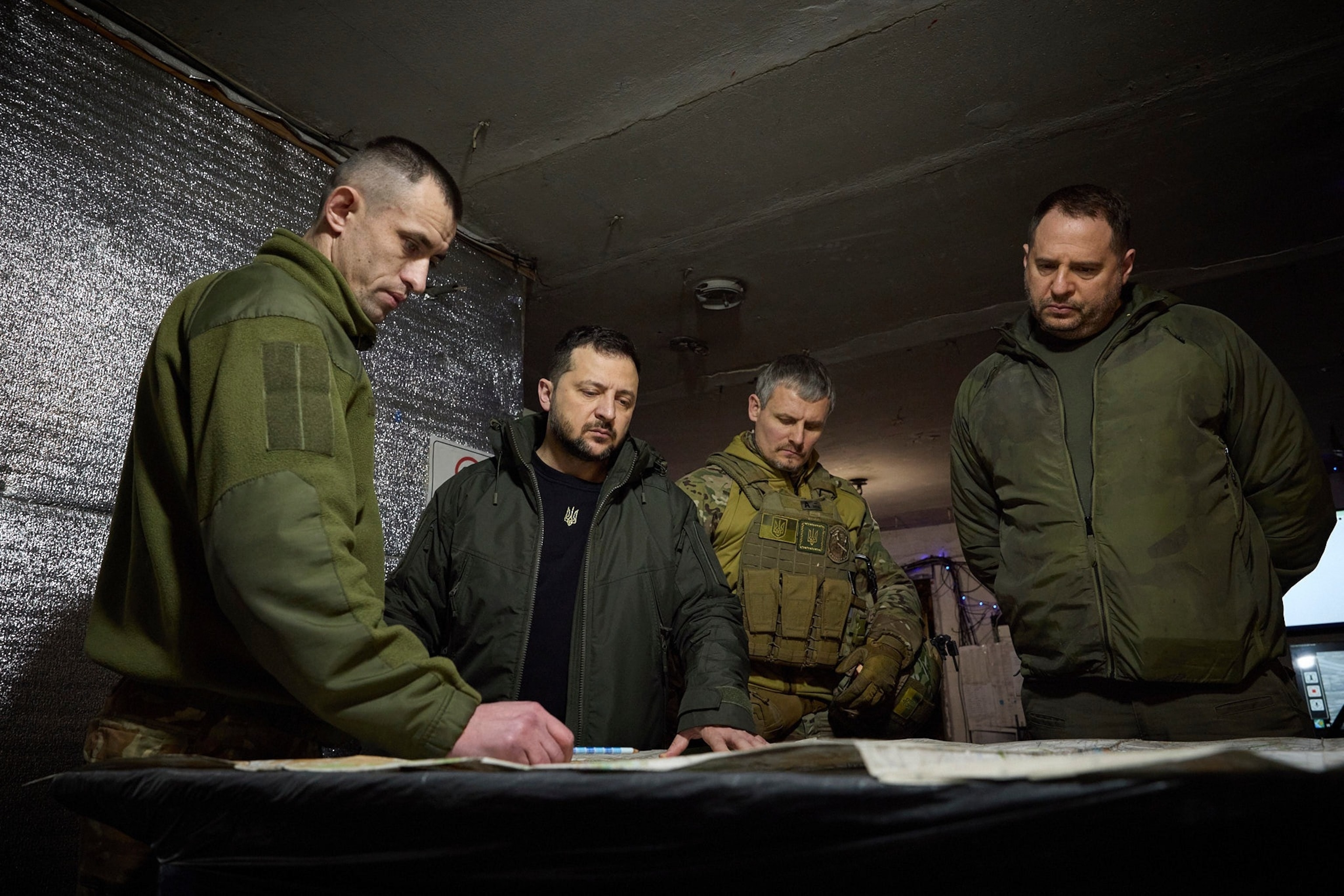 PHOTO: In this photo provided by the Ukrainian Presidential Press Office, Ukrainian President Volodymyr Zelenskyy and Andriy Yermak look at a map during a visit to Avdiivka, in the Donetsk region of Ukraine, on Dec. 29, 2023.