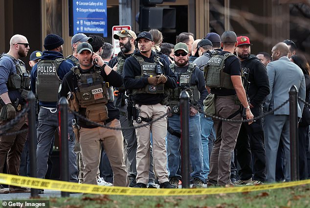 Members of law enforcement, including the U.S. Marshals, respond to a shooting near the White House
