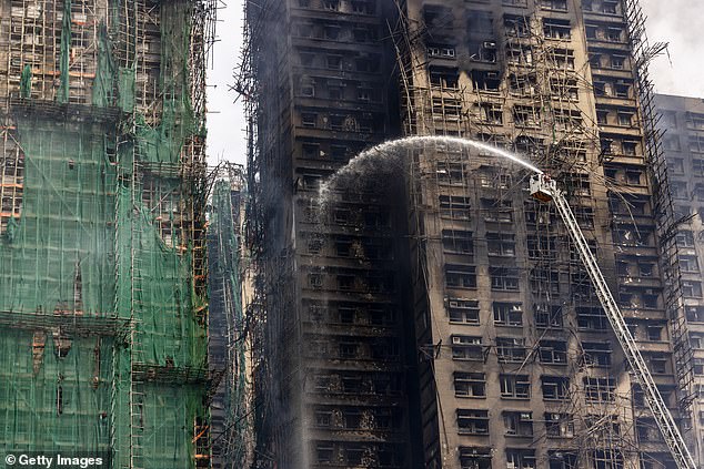 Residential buildings continue to burn at Wang Fuk Court in the Tai Po district on November 27, 2025 in Hong Kong, China