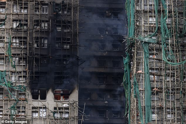 Residential buildings continue to burn at Wang Fuk Court in the Tai Po district on November 27, 2025 in Hong Kong, China