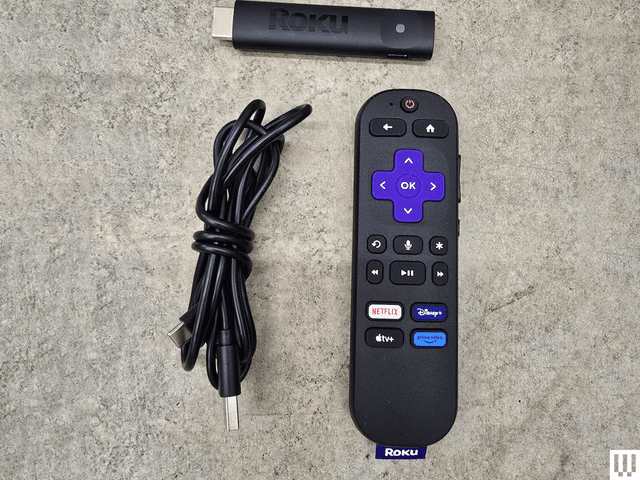 Image may contain: Electronics, Remote Control, Adapter, and Smoke Pipe