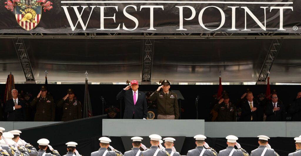 President Donald Trump and superintendent Lieutenant General Steven W. Gilland salute graduates of the United States Military Academy at West Point.