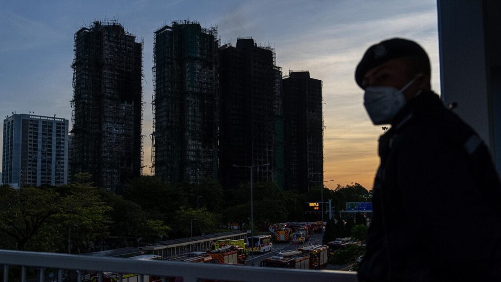 Hong Kong firefighters make final search, apartment tower blaze kills 94