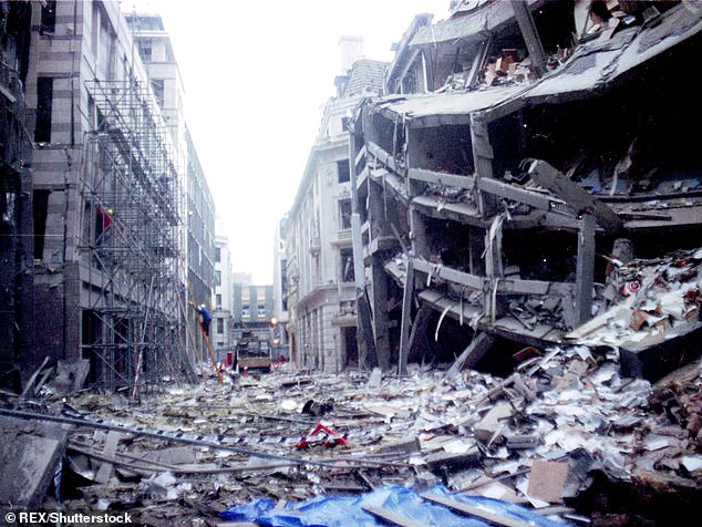Labour has been accused of letting IRA terrorists ¿rewrite history¿ after it emerged former paramilitaries may sit on a veterans¿ board - as nine fresh cases look set to be brought against British army veterans. Pictured: the aftermath of the IRA bomb which destroyed London's Baltic Exchange in April 1992
