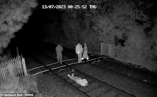 Young people were seen lying down on the tracks in footage released by Network Rail last year