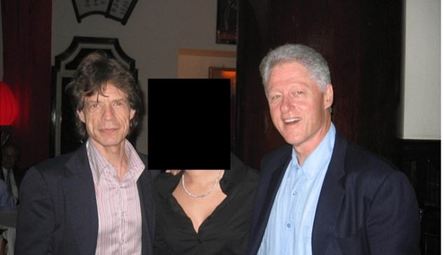 Jeffrey Epstein posing alongside Michael Jackson in an undisclosed location