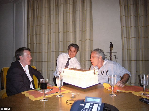 Epstein pictured blowing out birthday candles with British politician Peter Mandelson