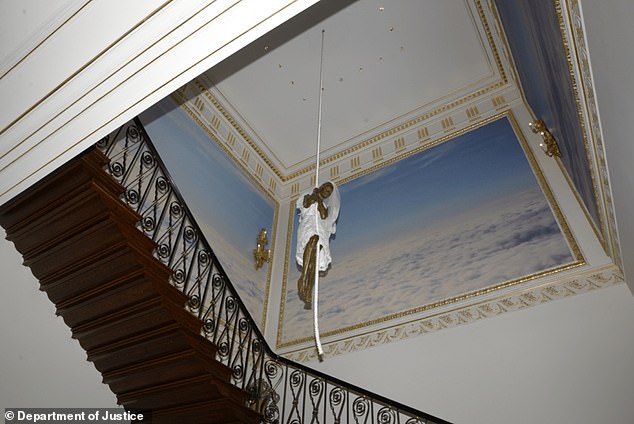 An artwork in Epstein's home depicts a bride sliding down a rope