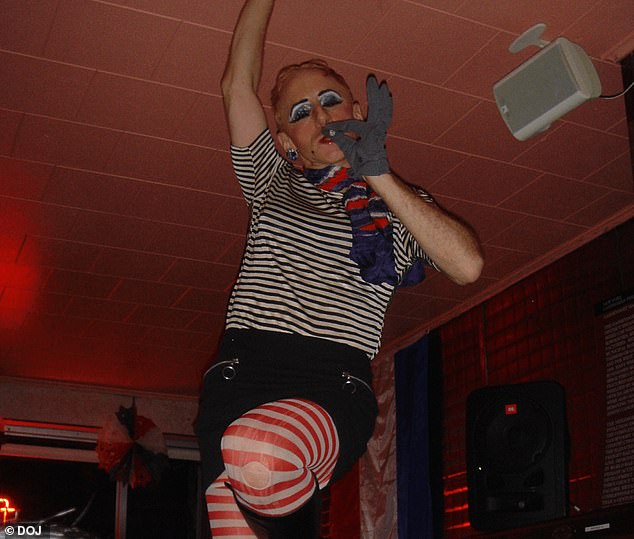 A male dancer poses with a cigarette in a series of photos released by the DOJ