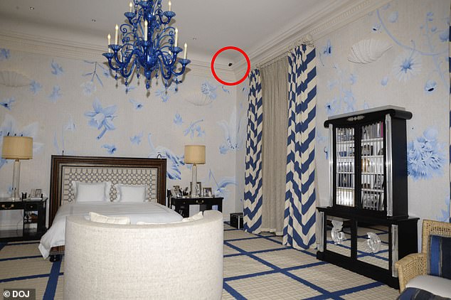 A camera (circled) is seen in one of Epstein's bedrooms in a photo released by the DOJ on Friday