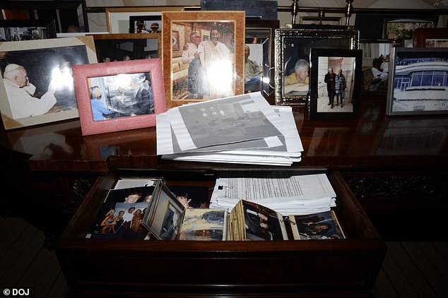 Images framed in Epstein's home included a photo of Pope John Paul II