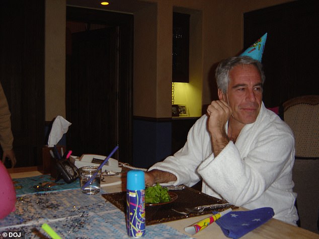 Epstein is pictured in a robe and a birthday hat eating a salad