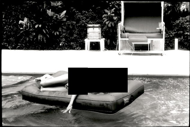 Pictured is an unidentified woman lounging on a pool float