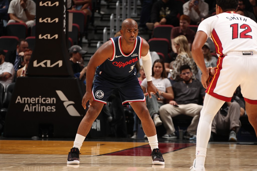 Chris Paul #3 of the LA Clippers playing defense against the Miami Heat.