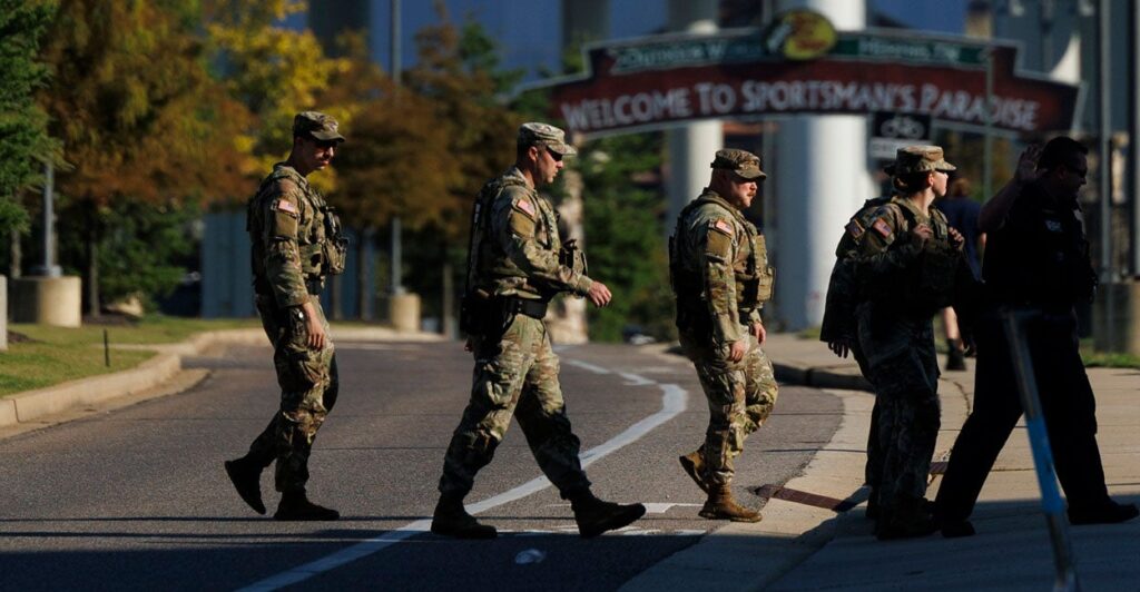 Members of the National Guard cross a street in Memphis.