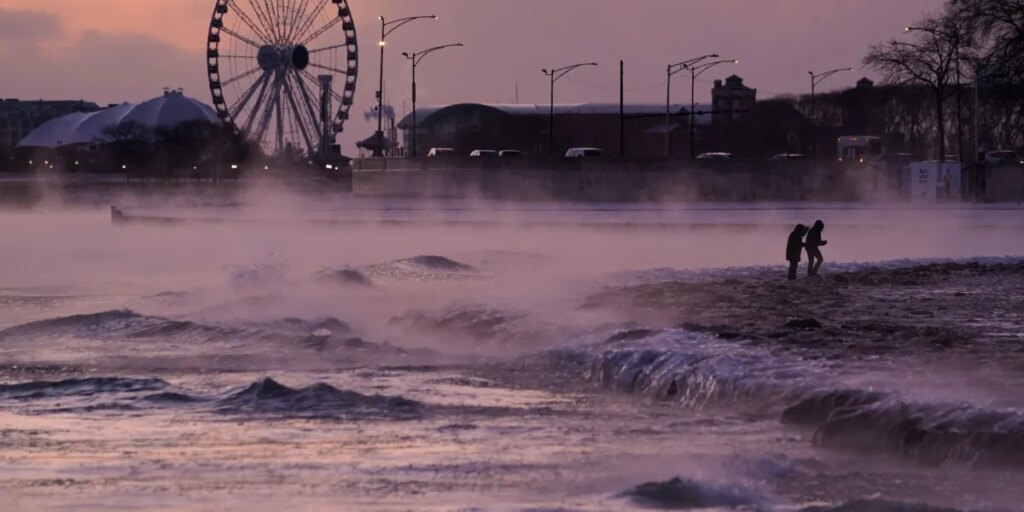 ‘I’ve been here a while and my brain stopped working’: Americans struggle with sub-freezing wind chill as storm closes in
