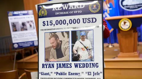 Getty Images Sign showing $15m reward for Ryan James Wedding
