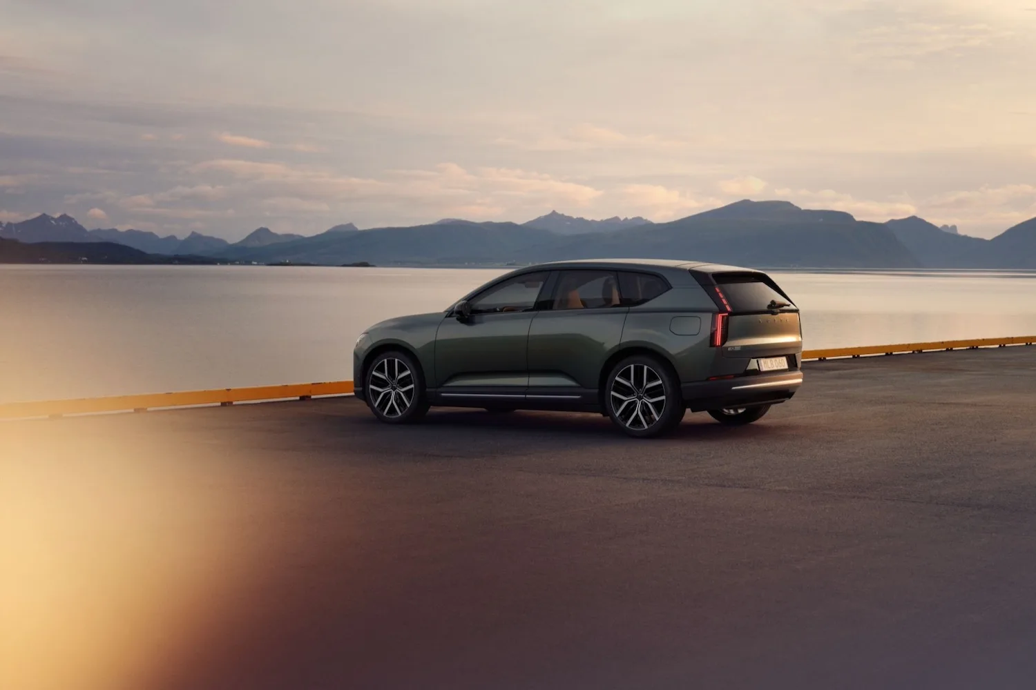 2027 Volvo EX60 rear quarter view.