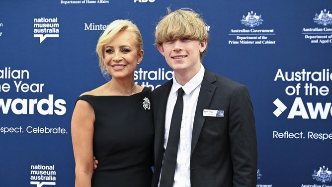 National nominee Carrie Bickmore OAM and son arrive for the awards ceremony at the National Arboretum, Canberra. Picture: NewsWire / Martin Ollman