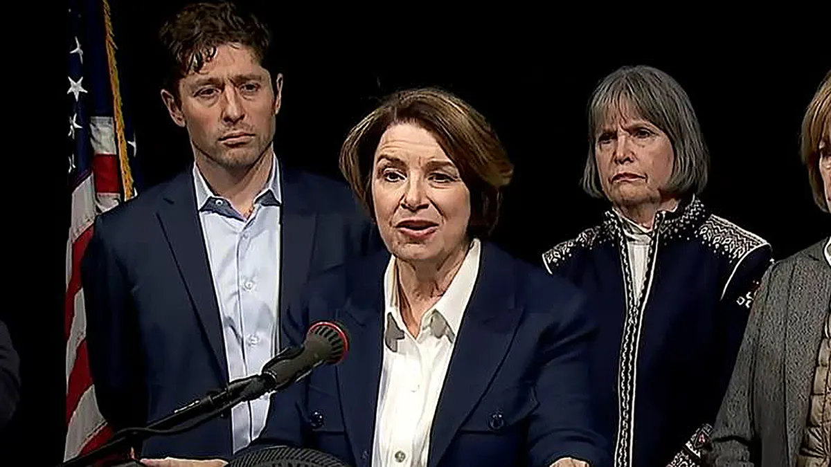 Amy Klobuchar speaking at a presser with Jacob Frey
