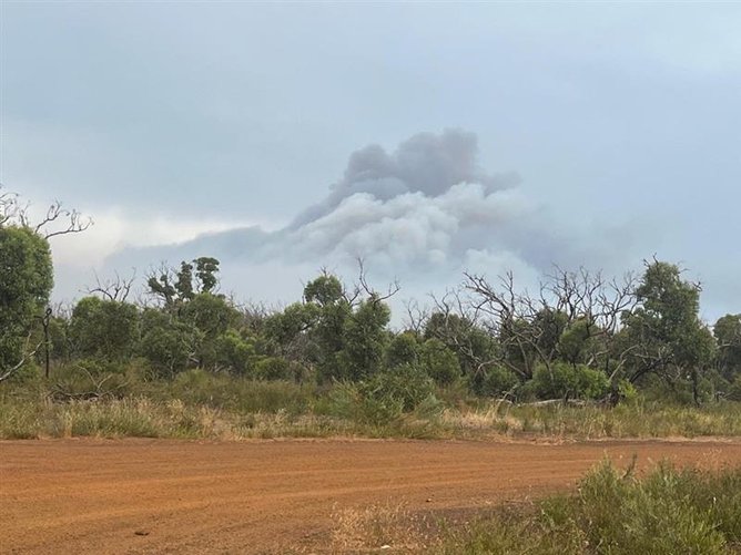 The fire seen from South Coast Highway.