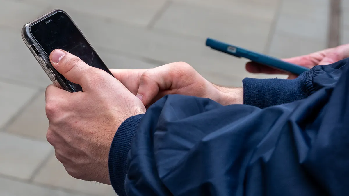 Person on their smartphone.