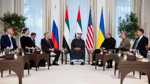 Reuters President of the United Arab Emirates Sheikh Mohamed bin Zayed Al Nahyan receives the heads of delegations participating in the UAE hosted trilateral talks between the United States, Russia and Ukraine. Eight people can be seen in the picture in total/ 