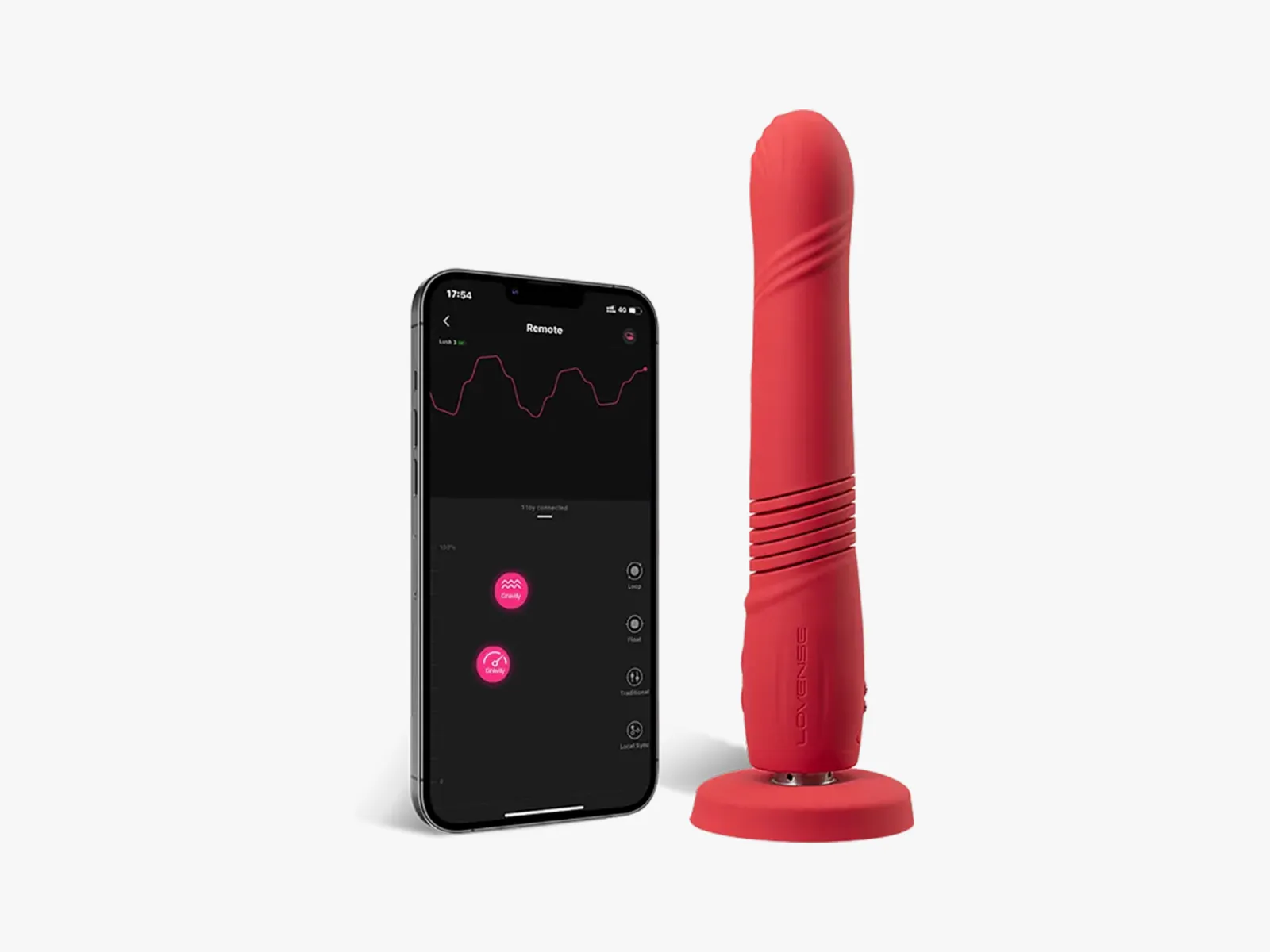Long narrow red sex toy beside a mobile phone with app