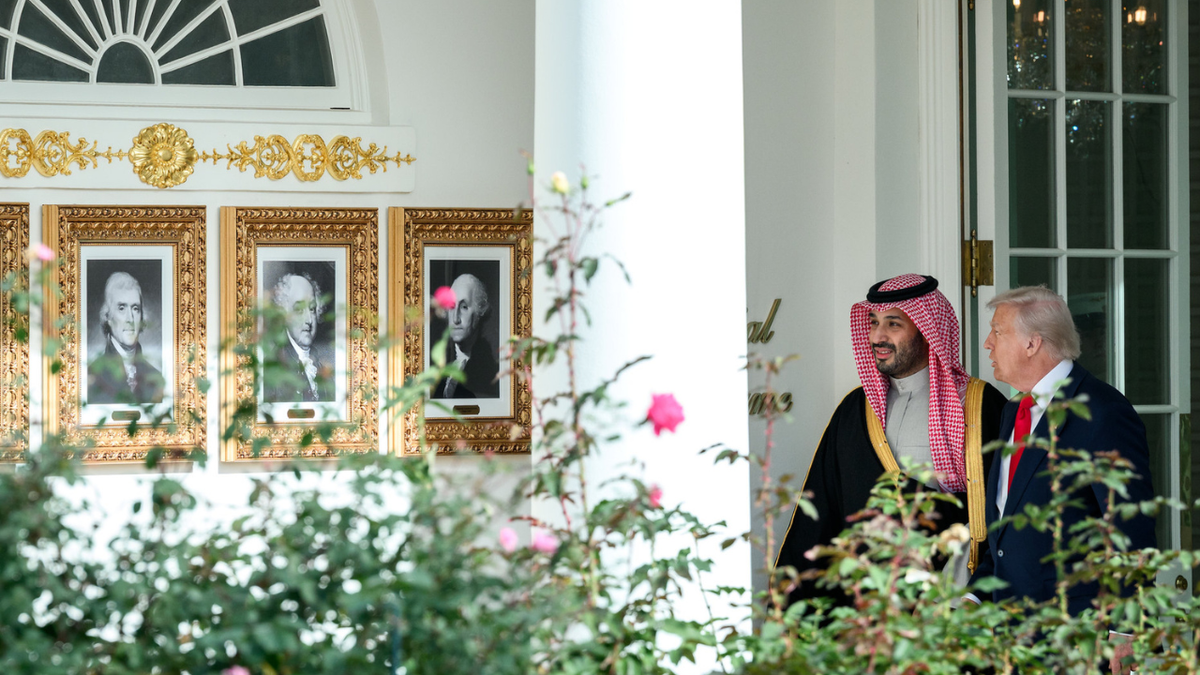 President Donald Trump speaks with Crown Prince and Prime Minister Mohammed bin Salman Al Saud along the 'Presidential Walk of Fame.'