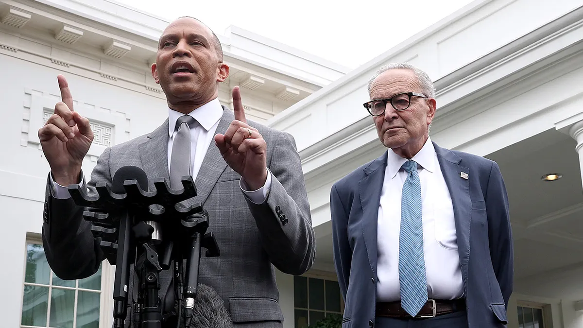 House Minority Leader Hakeem Jeffries and Senate Minority Leader Chuck Schumer speak to reporters outside the White House